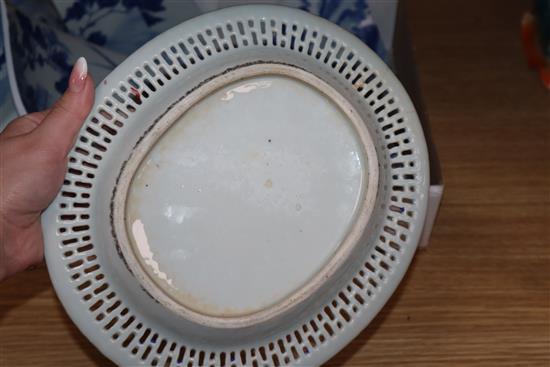 A Chinese famille rose basket and stand and a blue and white bowl, both a.f.